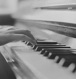 Hands at a piano